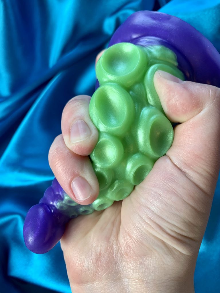 Tenton tentacle adult fantasy silicone sex toy being squished